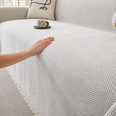 HAOMAIJIA non-slip couch cover on a 3-cushion sofa showing secure fit and protection