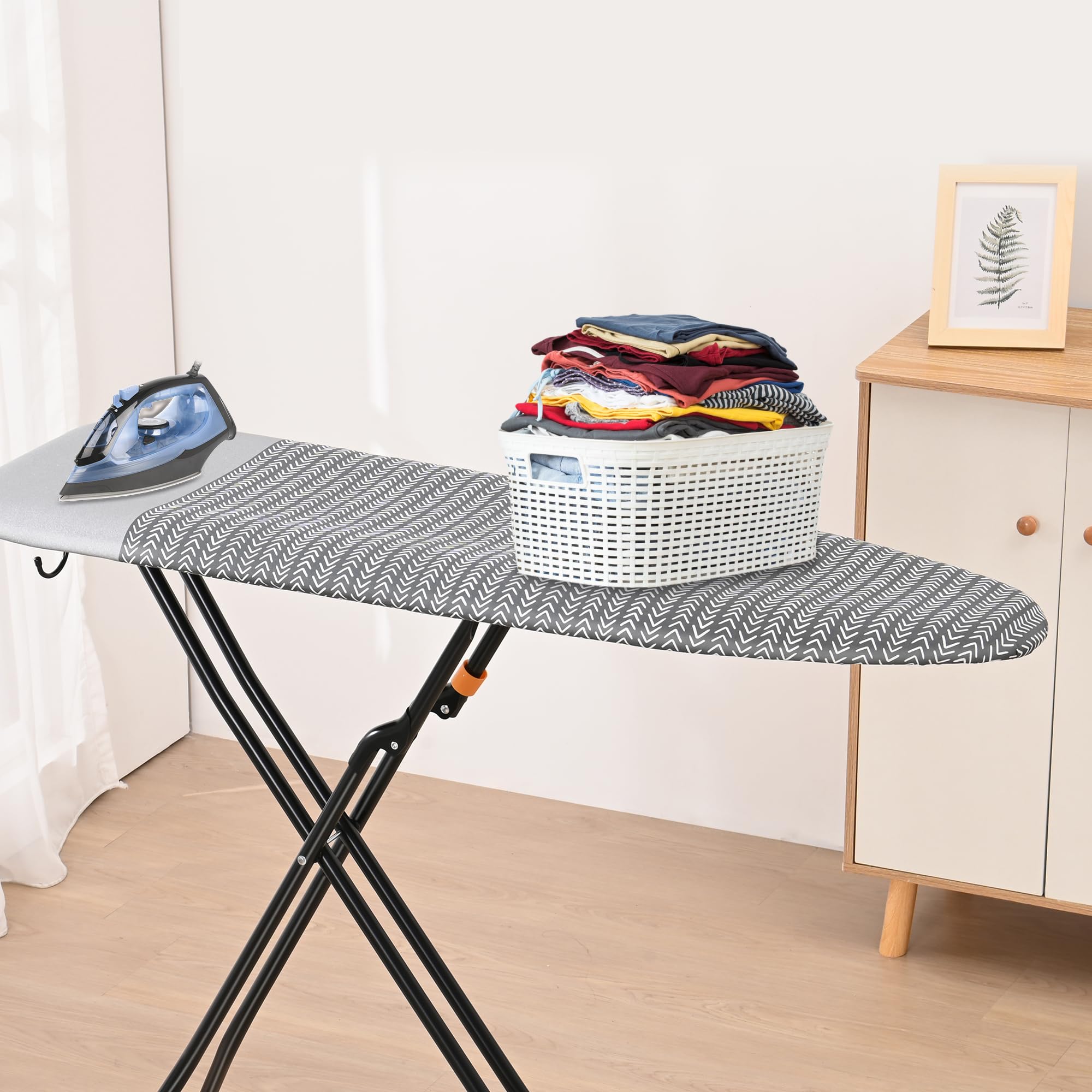 Happhom ironing board 13x43-inch footprint fits compact spaces.
