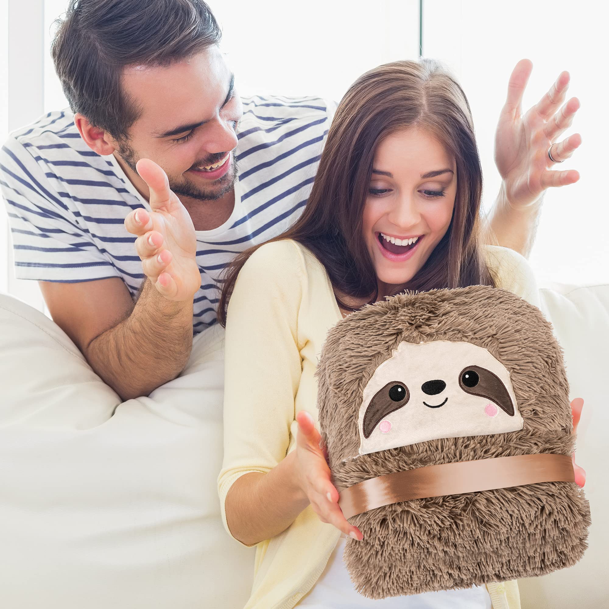Happy Fuel Sloth Hooded Blanket outdoors, perfect for a chilly coffee break.