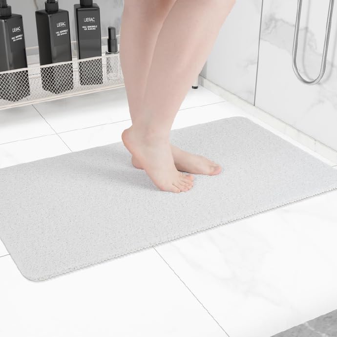 Hargiis non-slip bathtub mat on tub floor for safer stepping.