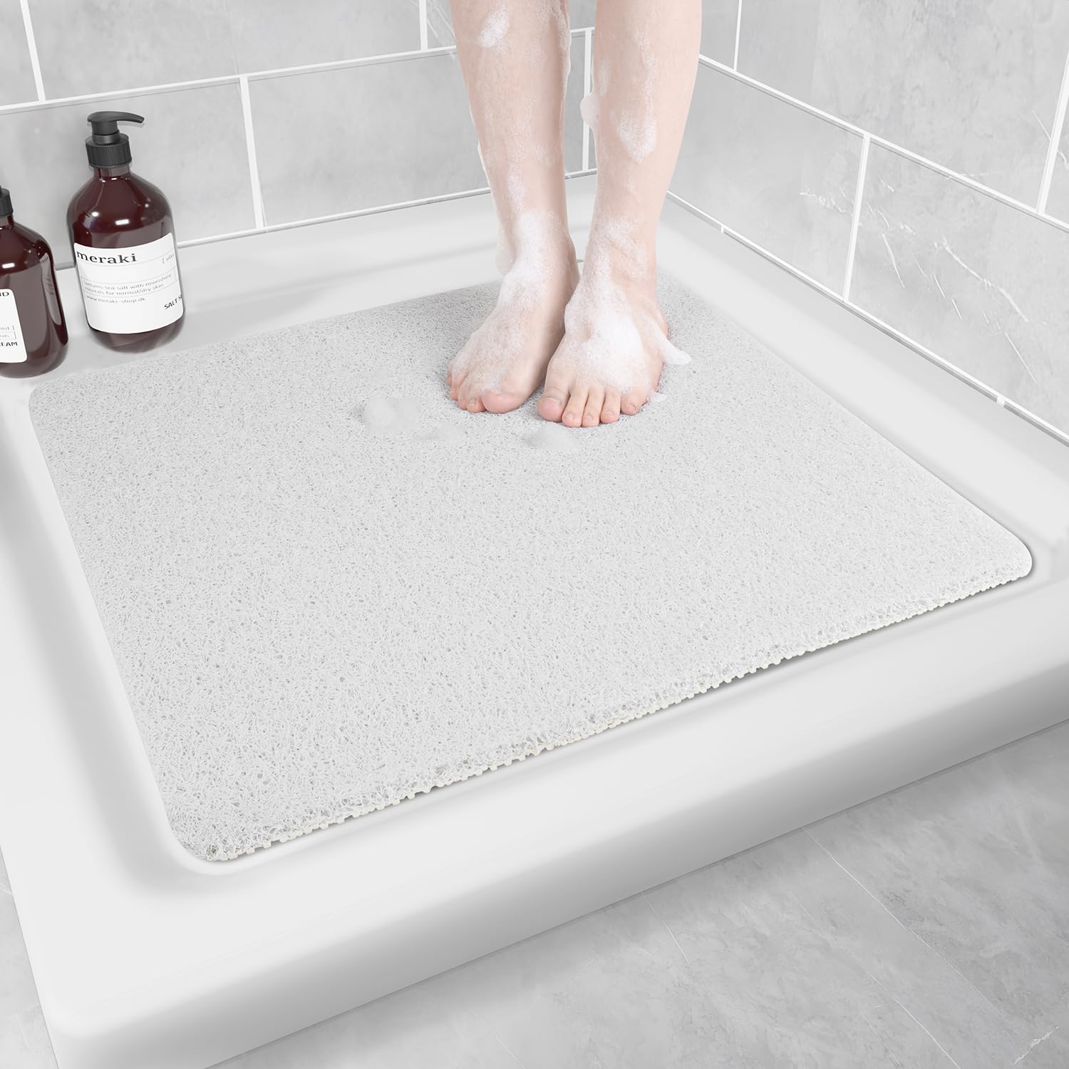 Hargiis non-slip bathtub mat with checkered backing offering secure safety and comfort in bathrooms.