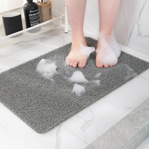 Hargiis non-slip shower mat in grey, 40x16 for secure footing.