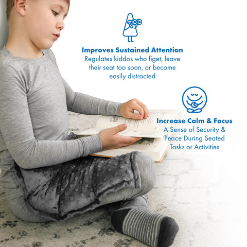 Harkla lap pad in school setting with child using it during class.