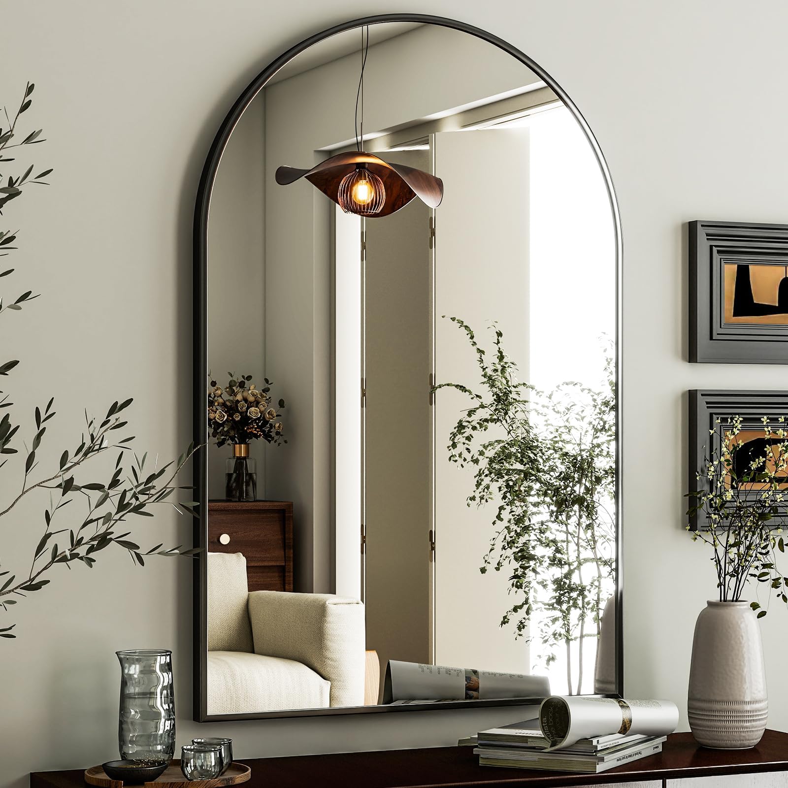 HARRITPURE arched wall mirror with black frame enhances bathroom vanity with clear reflections