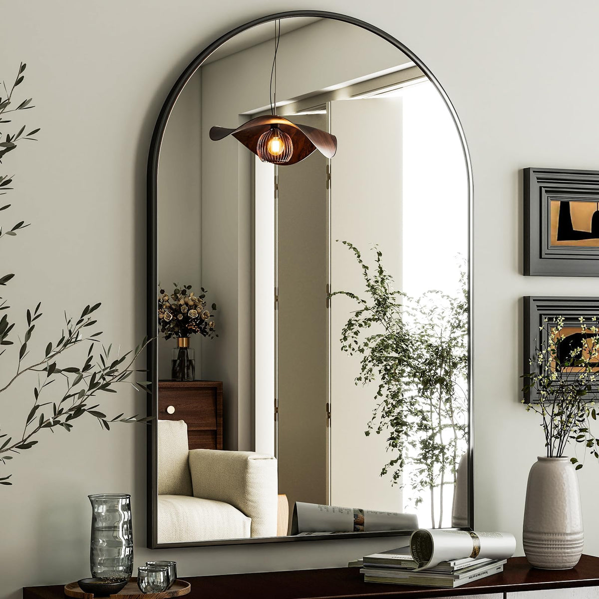 HARRITPURE arched wall mirror with black frame enhances bathroom vanity with clear reflections