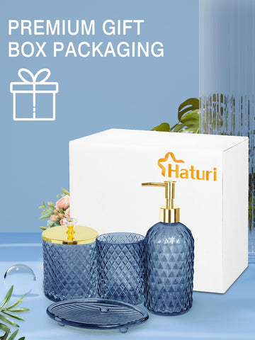 Haturi blue glass bathroom set with gold accents elevates modern decor.