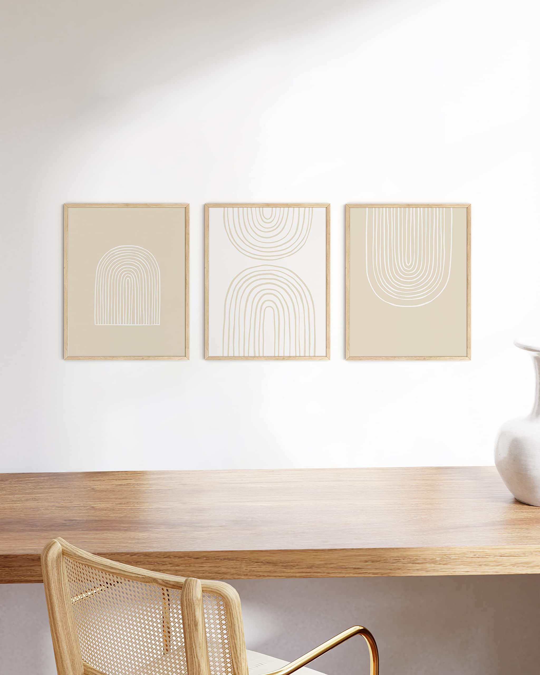 HAUS AND HUES 11x14 frames arranged on a wall for a balanced gallery