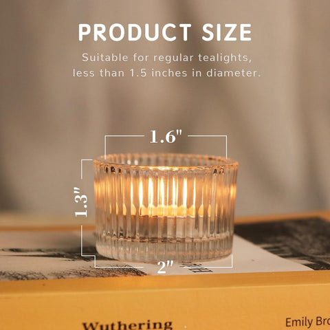 HAVITI glass votive holder with relief lines enhances table decor through light reflections.
