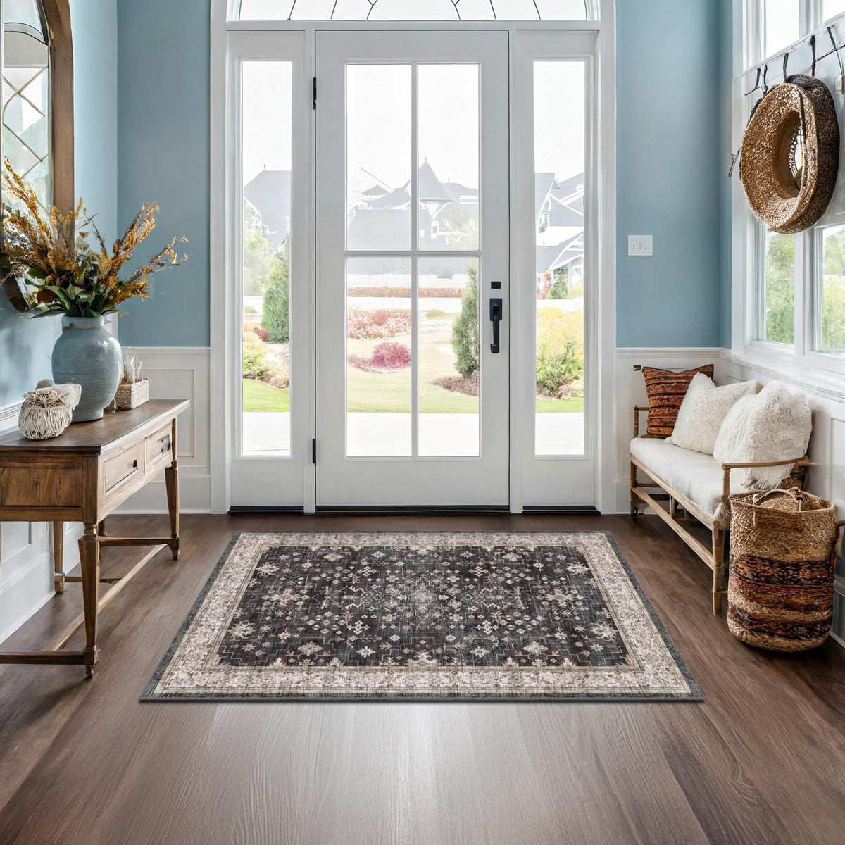 Hazo Haus Black Boho Entry Rug front view showing non-slip backing for secure placement.