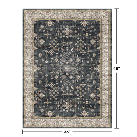 Hazo Haus Black Boho Entry Rug in kitchen area with stylish protective surface.