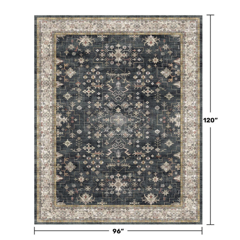 Close-up of distressed tribal texture in charcoal, beige, and ivory.