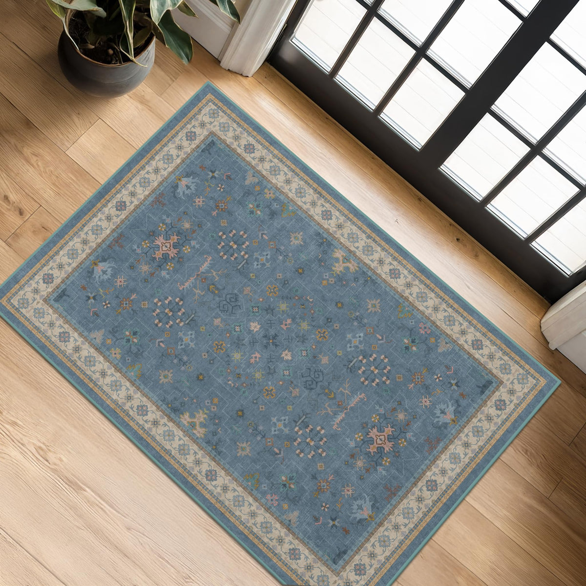 Hazo Haus blue 2x3 rug for entryway with non-slip backing.
