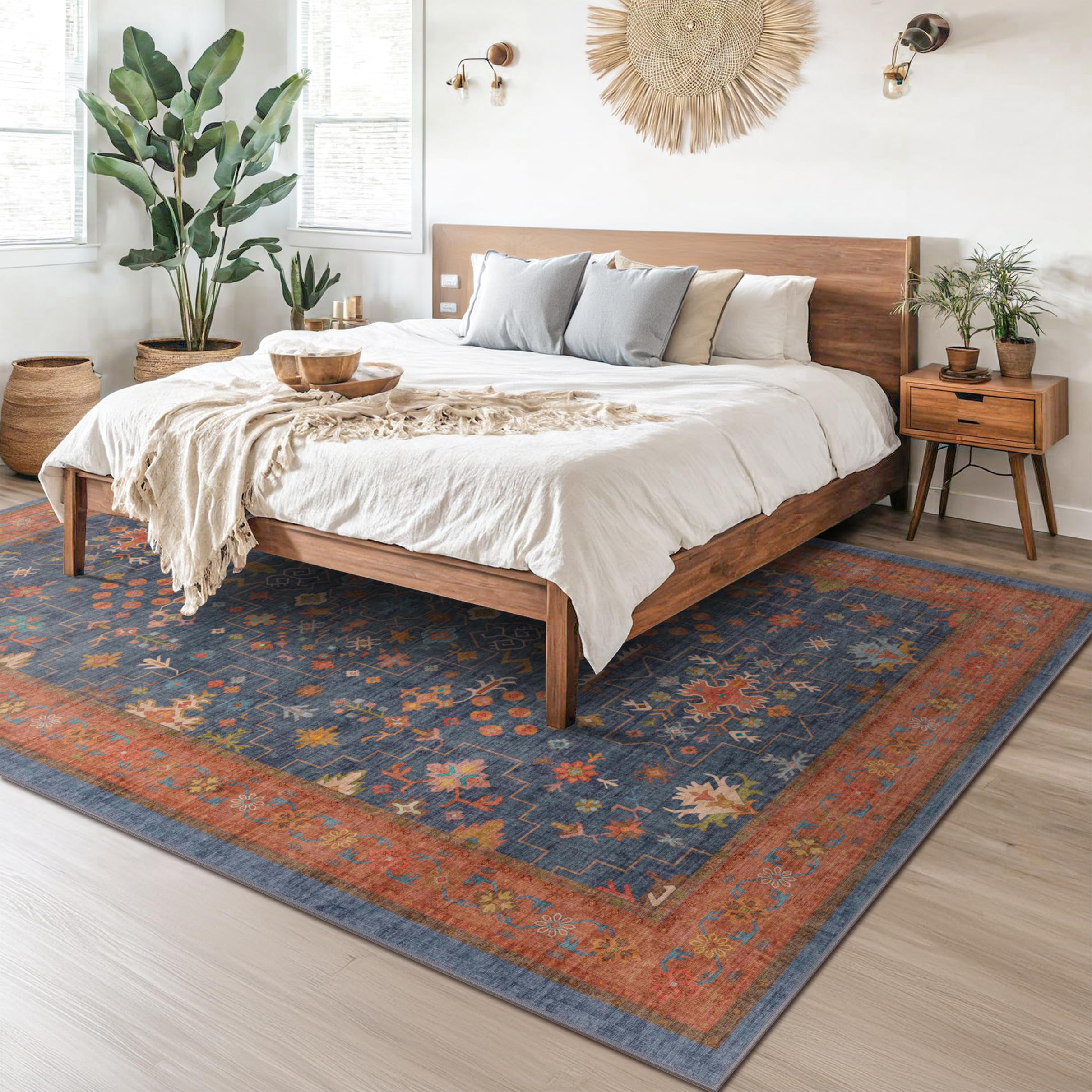 Hazo Haus dining room rug under table creates stylish anchor.