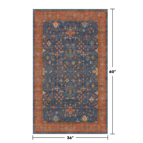 Hazo Haus non-slip rubber backing keeps entryway rug in place on smooth floors.