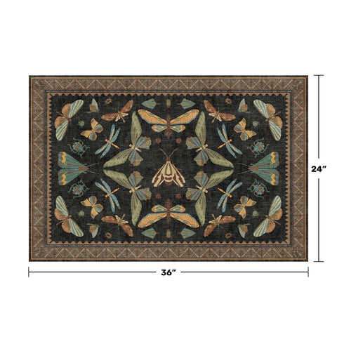 Hazo Haus insect-pattern rug close-up highlighting vintage moths and butterflies.