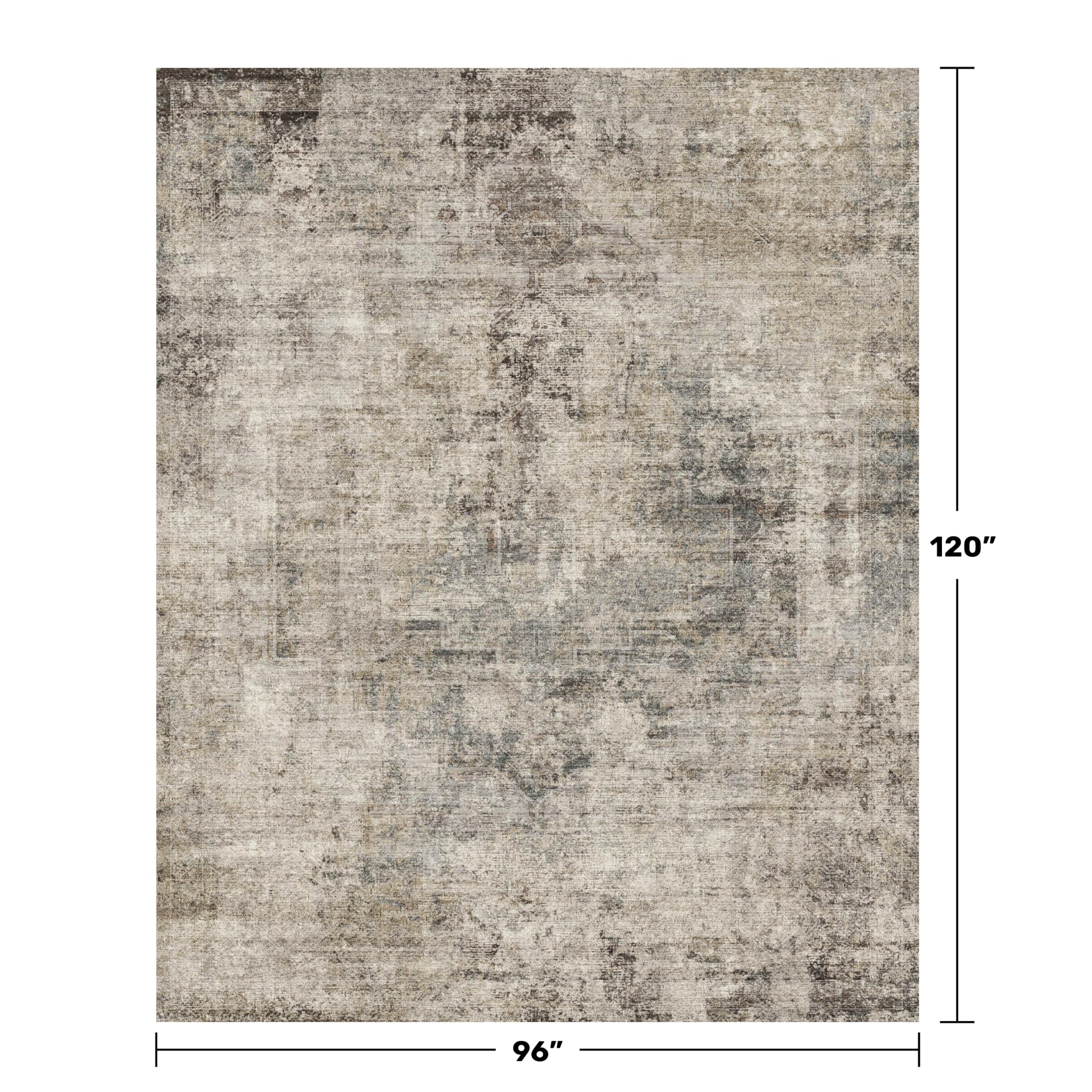 Hazo Haus vintage distressed medallion rug adds timeless charm to bedrooms.