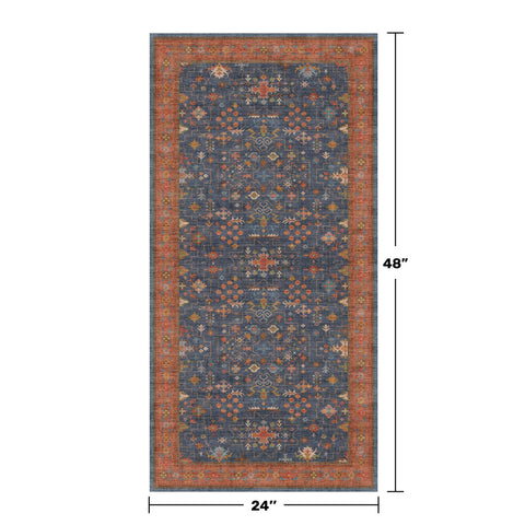 Hazo Haus navy blue tribal pattern rug adds a focal point in a busy entryway.