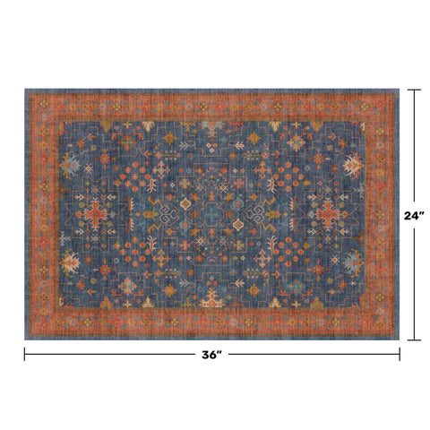 Hazo Haus navy blue tribal entry rug showing non-slip rubber back for stability.