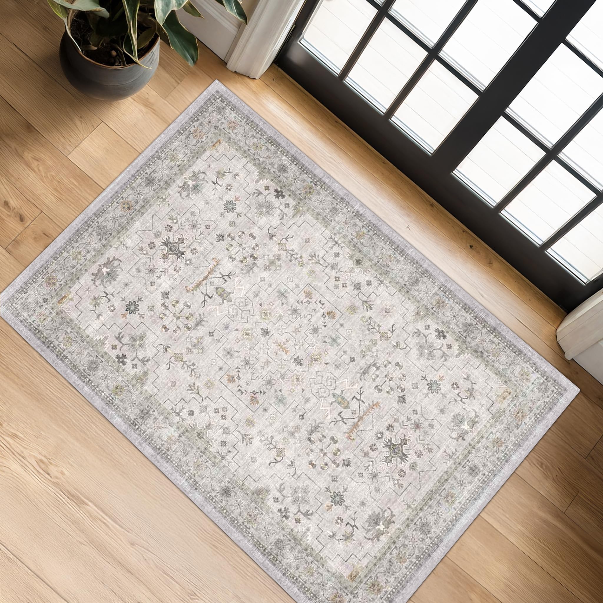 Hazo Haus washable 2x3 entryway rug with floral accent offers welcoming durability.