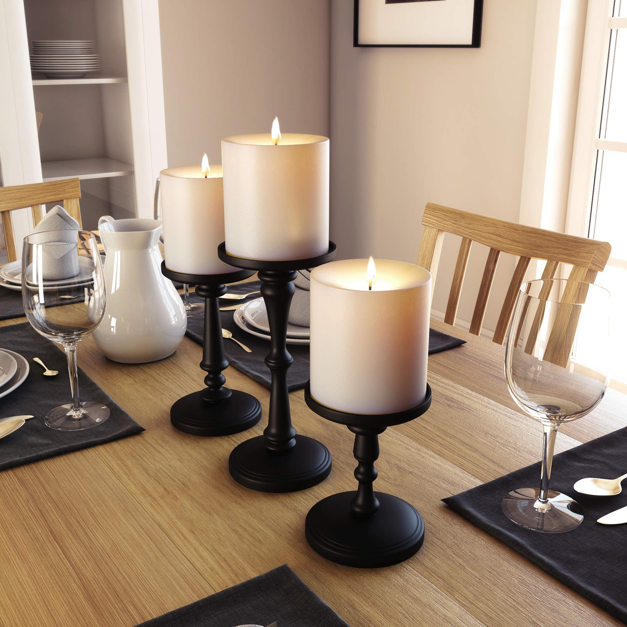 HB Design Co black candle holder includes anti-scratch base for surfaces.