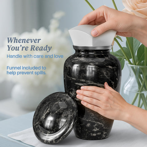 Hearthy Home detailed black marble urn, showcasing craftsmanship.