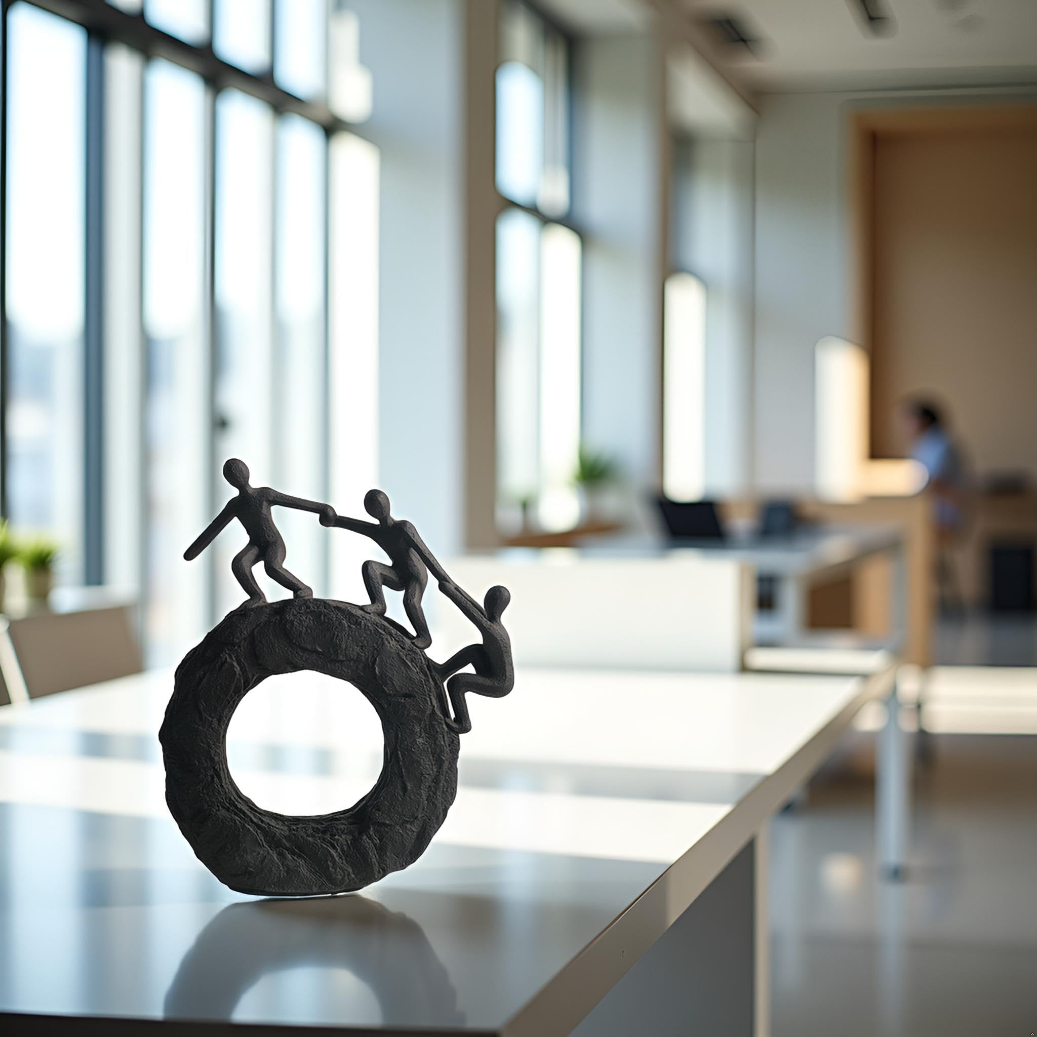 Hebdids sturdy circular-base sculpture provides stable desk or shelf decor.