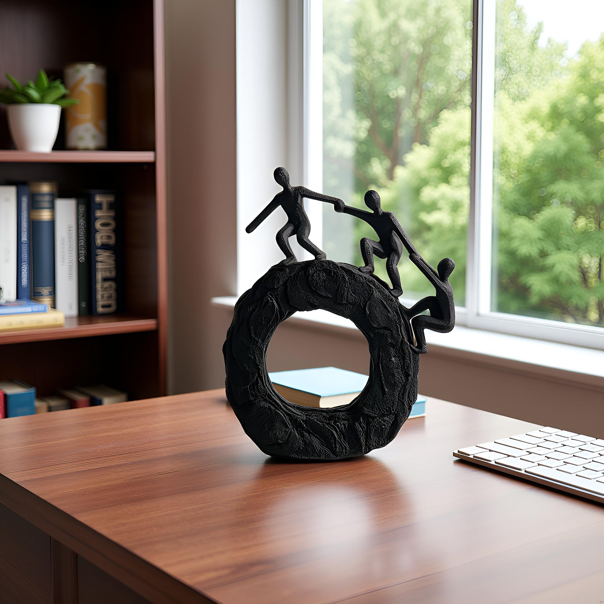 Hebdids black statue adds modern elegance to office desks and shelves.