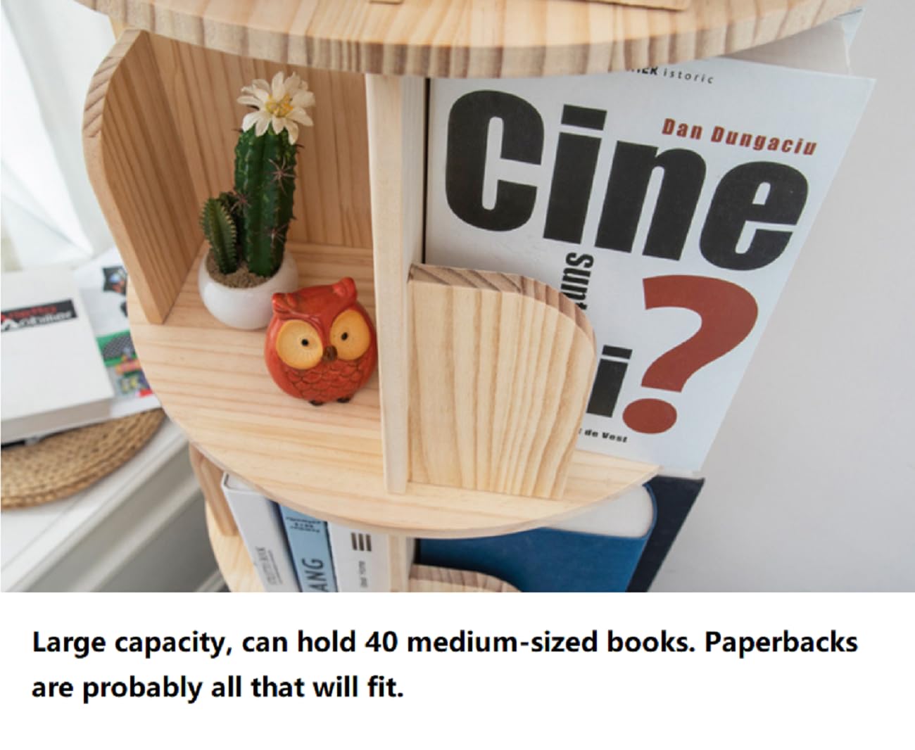 Rotating display holds graphic novels and trade paperbacks within reach