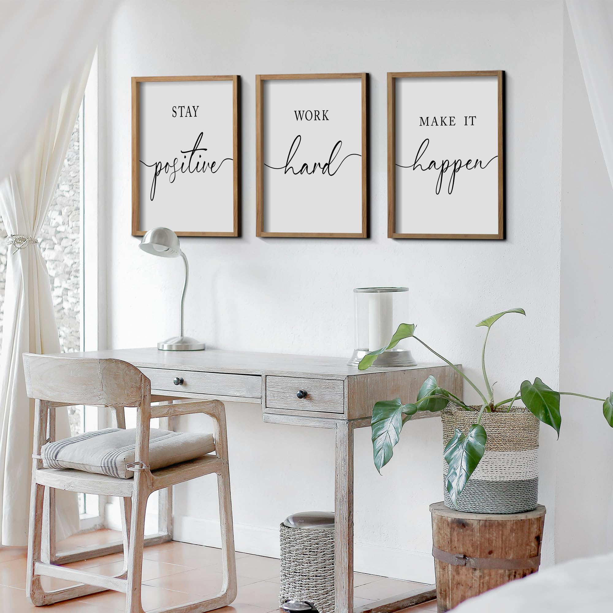 Heiple office desk setup with wall decor adding character and motivation.