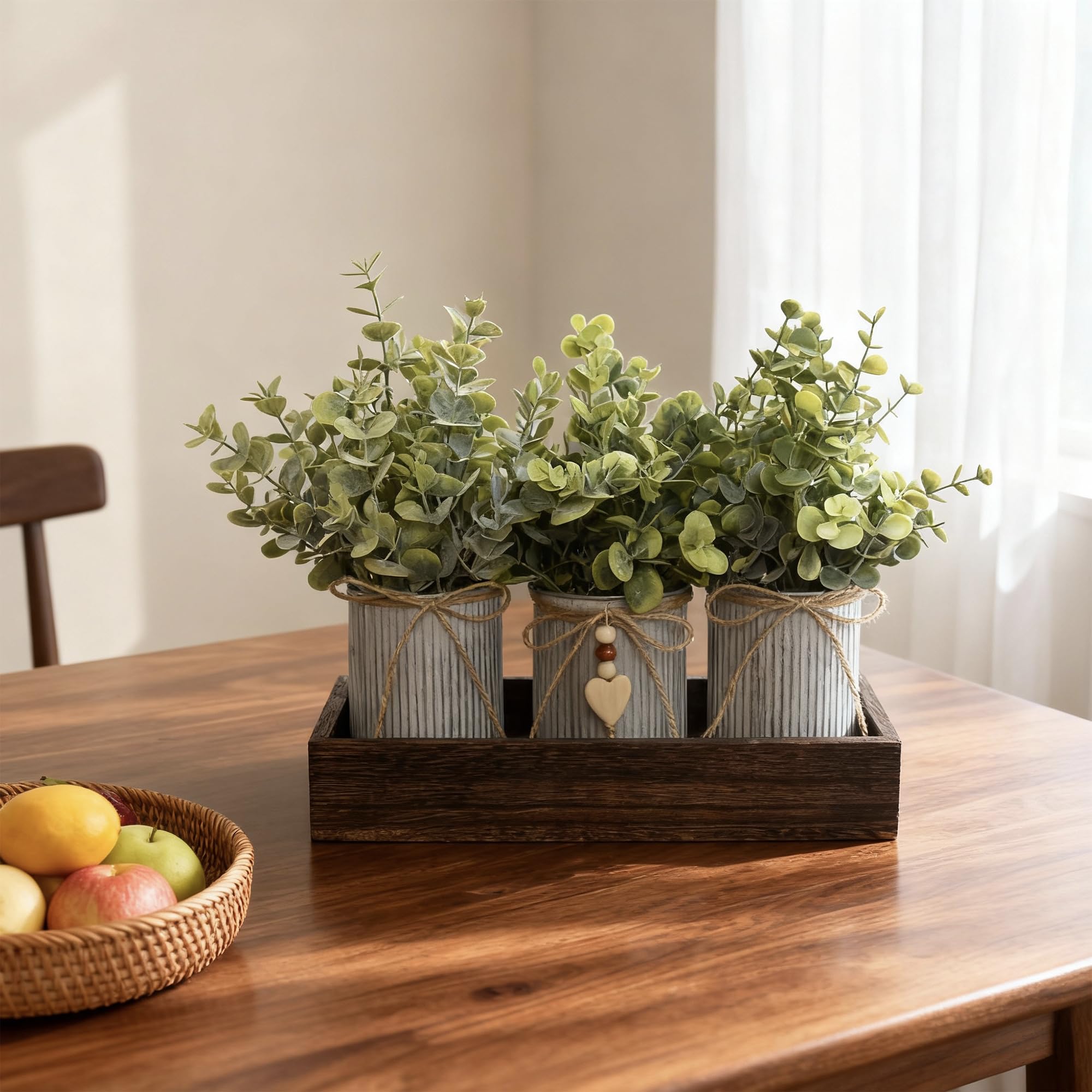 HEMYLU rustic metal pots with frosty green eucalyptus add vintage charm.