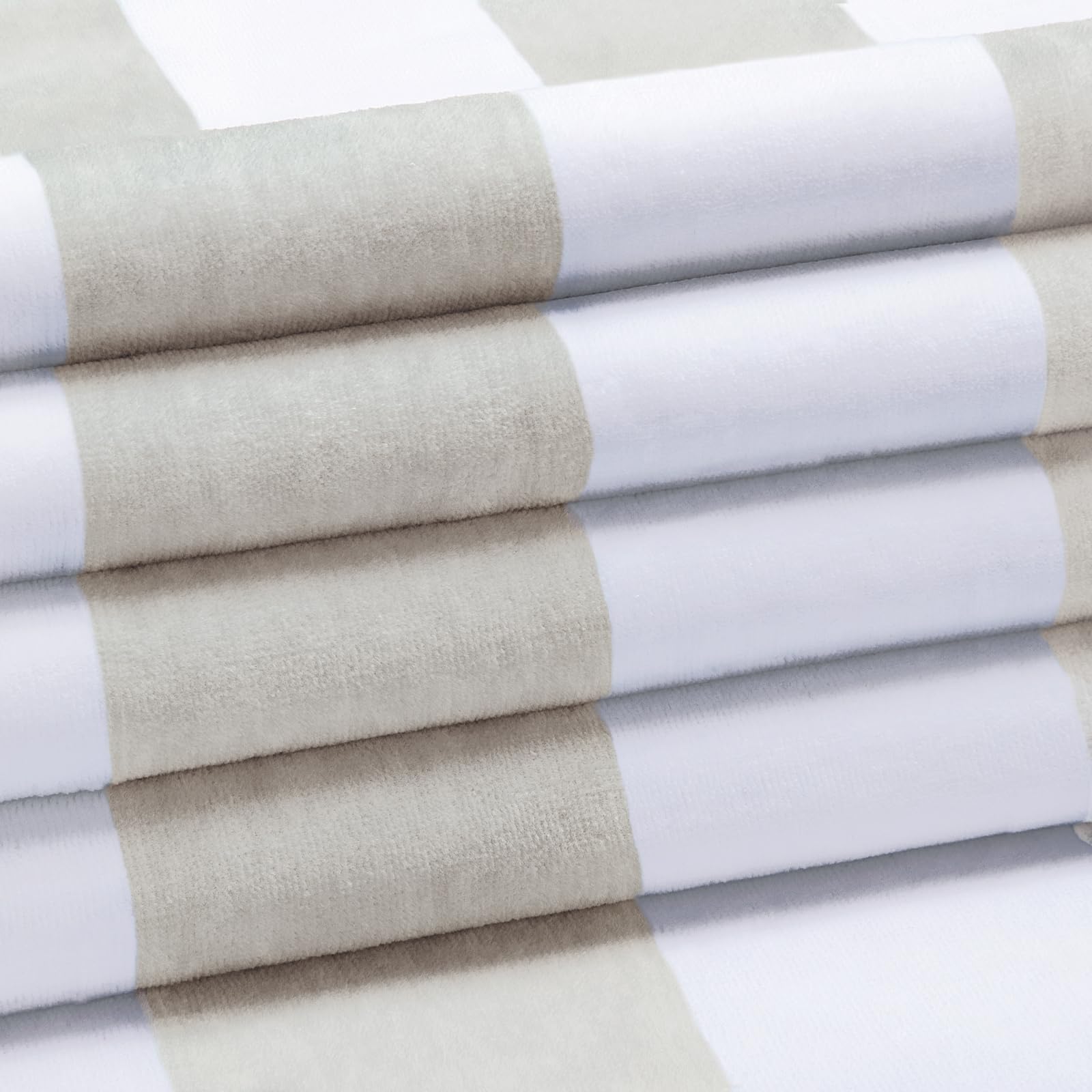 HENBAY towel laid flat, 70 by 35 inches for expansive lounging.