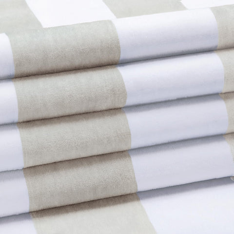 HENBAY towel laid flat, 70 by 35 inches for expansive lounging.