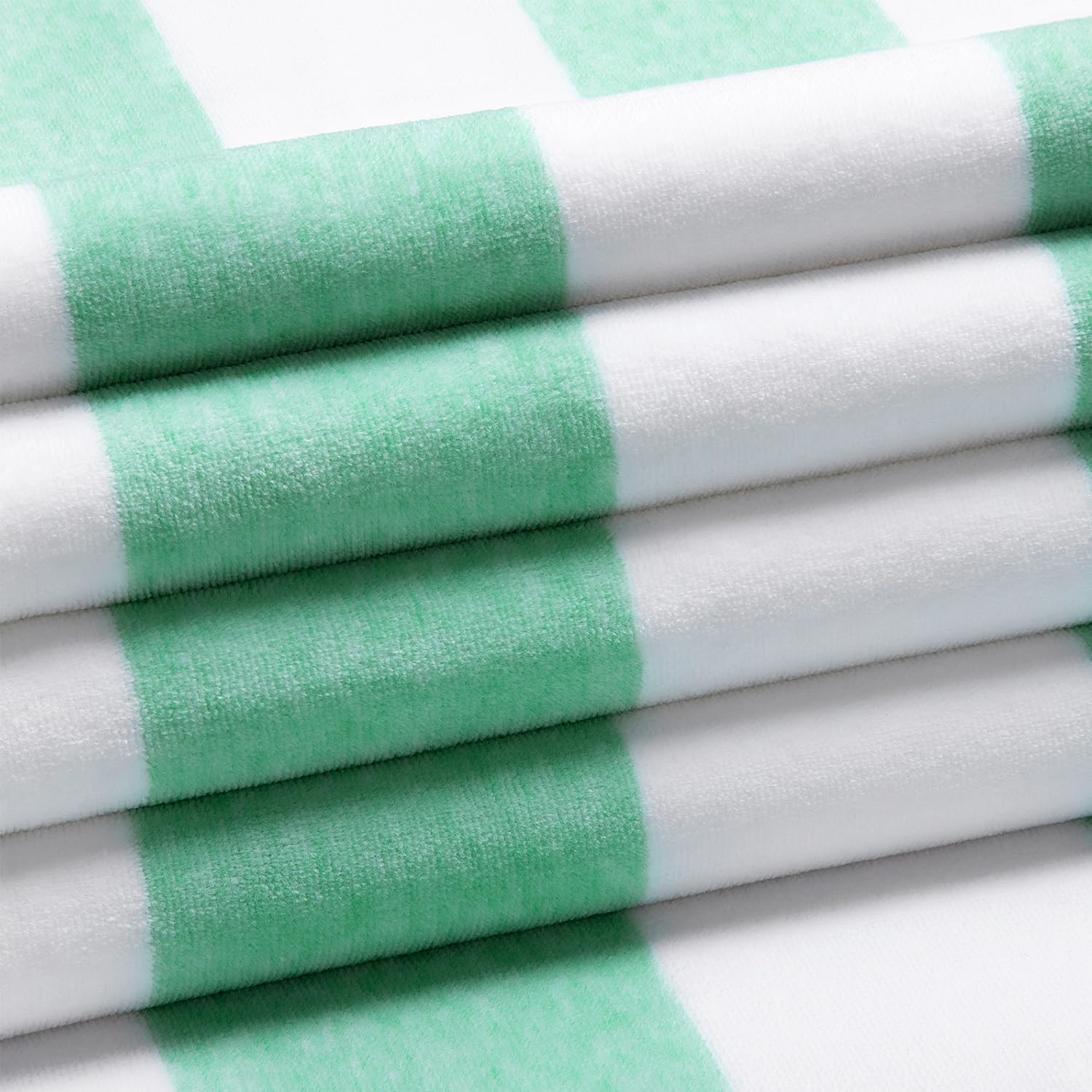 HenBay green-striped towel spread flat, large surface ideal for beach or cabana.