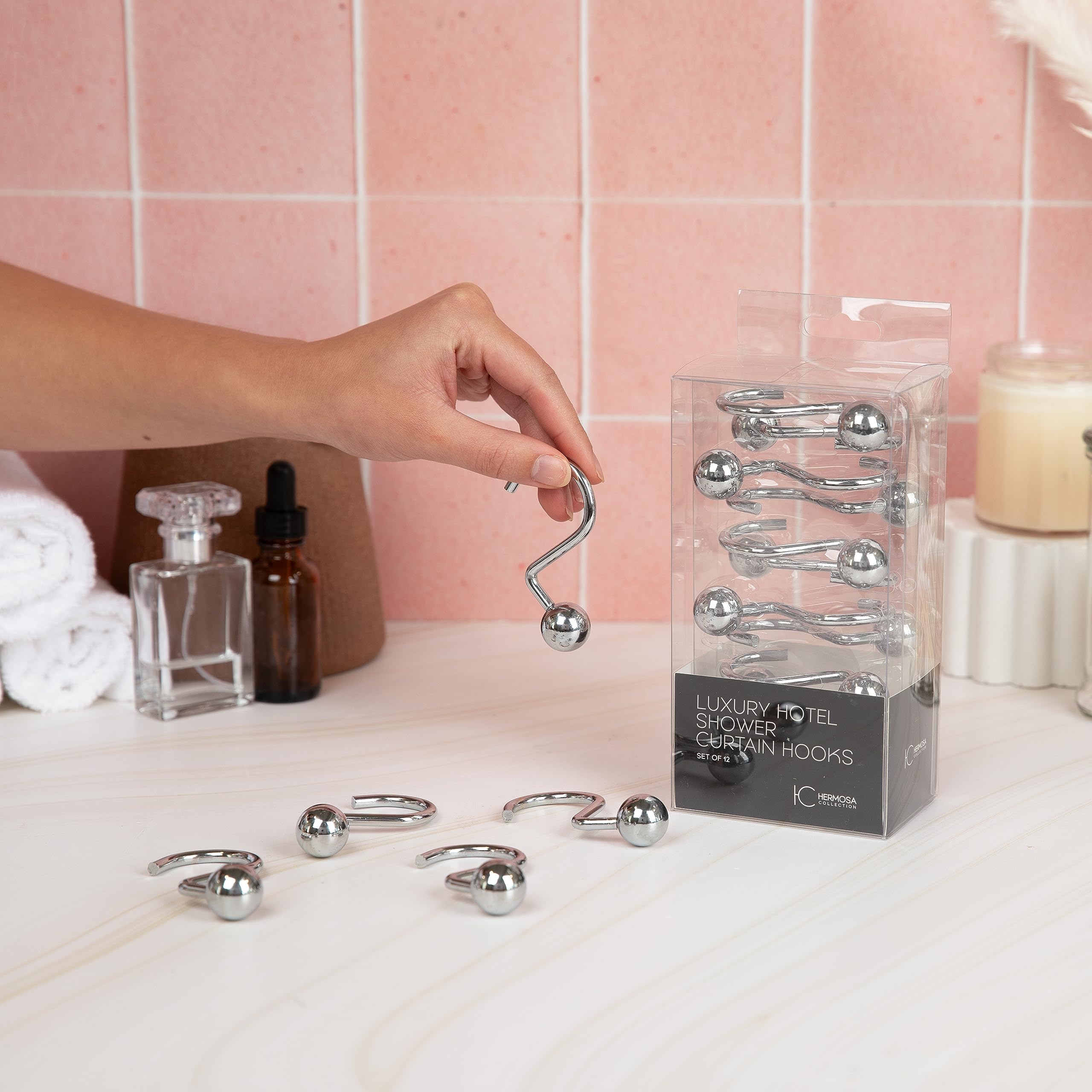 Non-slip ball end hooks securely guide curtains along the rod.