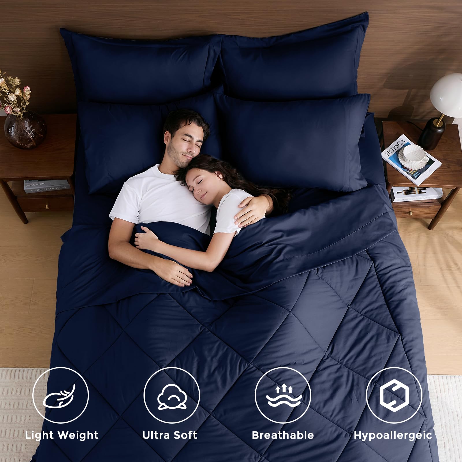 HEVUMYI Navy Blue Queen Comforter Set fabric texture shows plush softness and breathability.