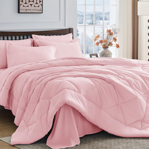 HEVUMYI Pink Queen comforter delivers cloud-soft warmth for all-season comfort.