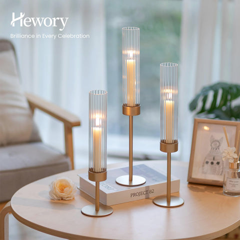 Hewory Gold hurricane candle holders have a weighted metal base to keep tall decor steady.
