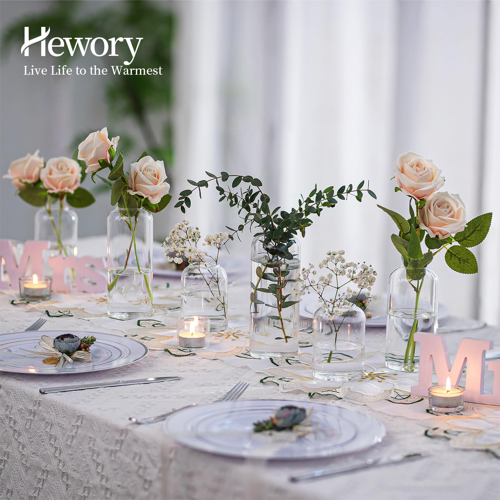 Hewory sleek clear vase sits beautifully on a desk or kitchen nook.