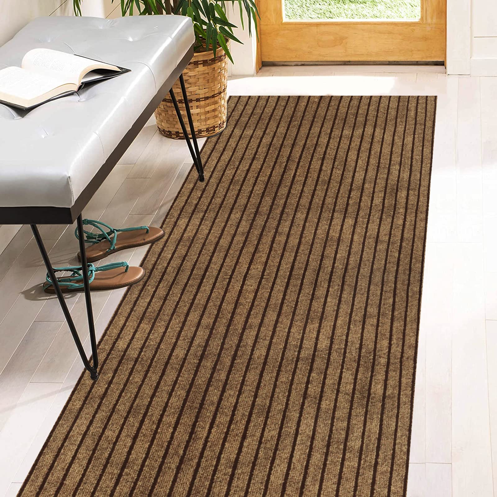 Heyroll two-by-six stripe brown rug with rubber backing for high-traffic entrances.