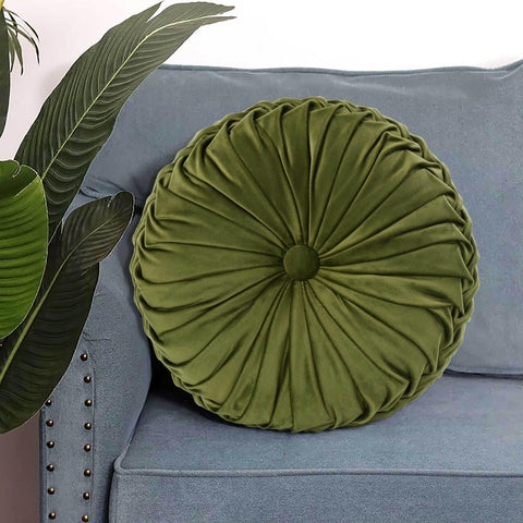 HIG two-pack pillows on chair demonstrate compact decorative versatility.