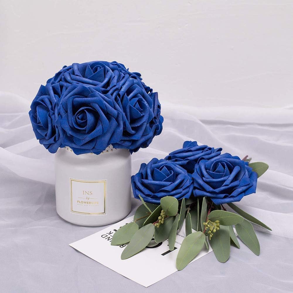 Higfra royal blue roses in vase ready for centerpiece display