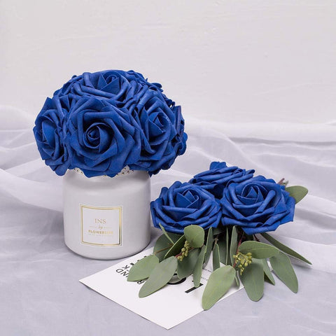 Higfra royal blue roses in vase ready for centerpiece display