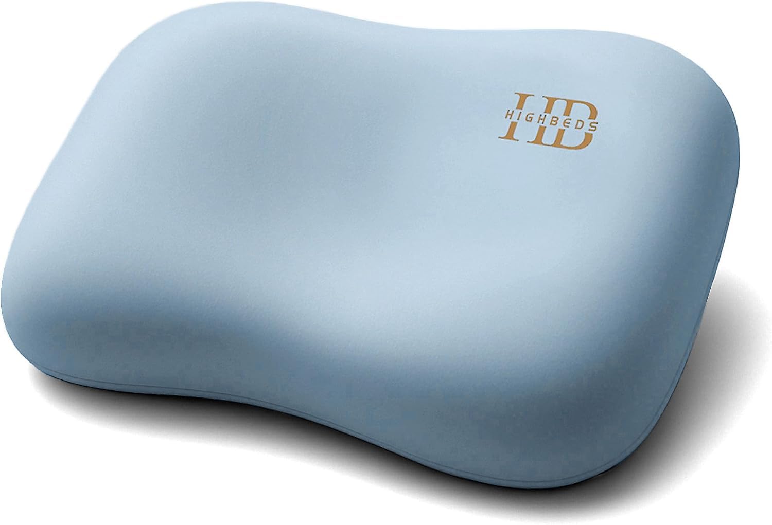 HighBeds cervical neck pillow beside a side-sleeper, highlighting neck support.