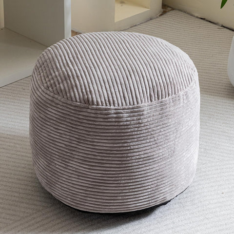 HIGOGOGO pouf provides seating and light storage in grey.