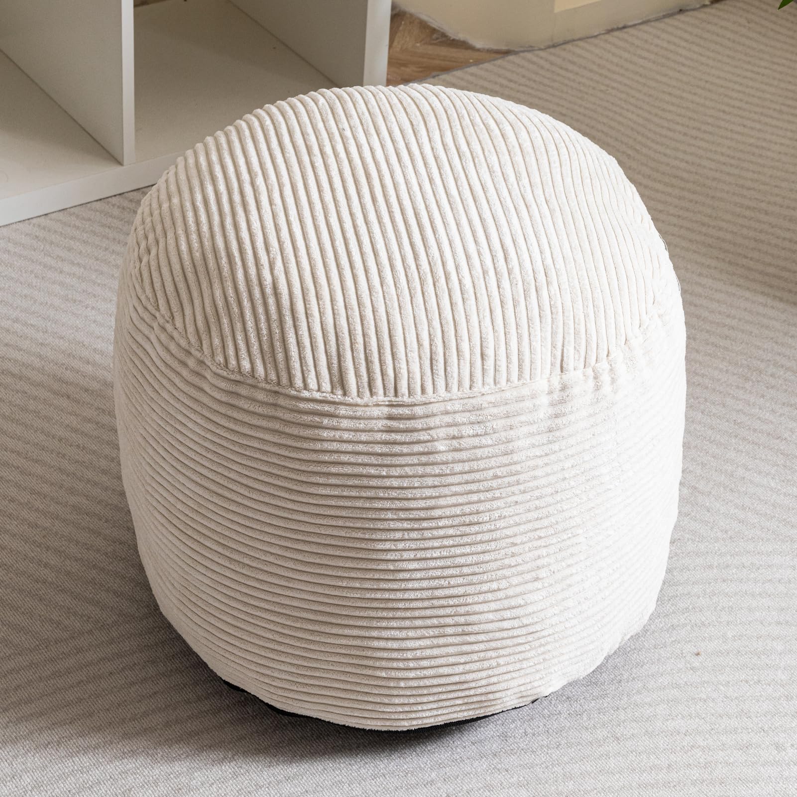 HIGOGOGO round pouf adds a decorative, soft-touch accent to any space