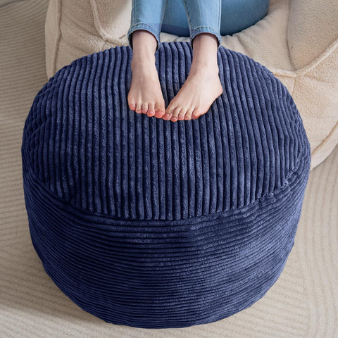 HIGOGOGO navy round pouf front view, inviting soft seating for a living room.