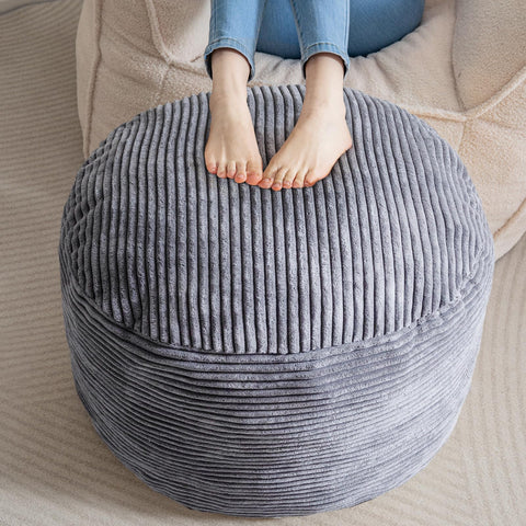 HIGOGOGO round corduroy pouf close-up shows plush fabric and inviting comfort.