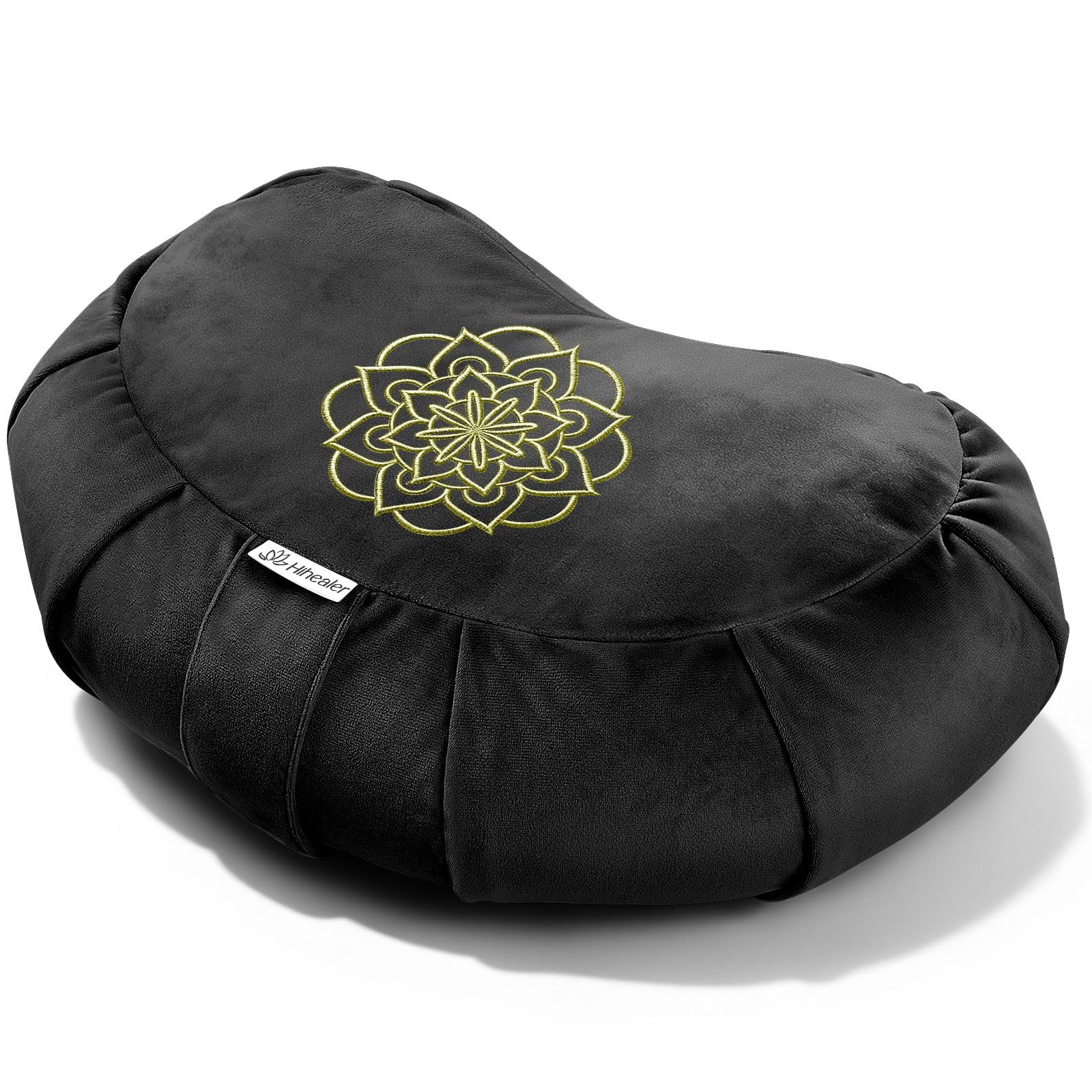 Hihealer Crescent Meditation Cushion on mat supports comfortable seated meditation.