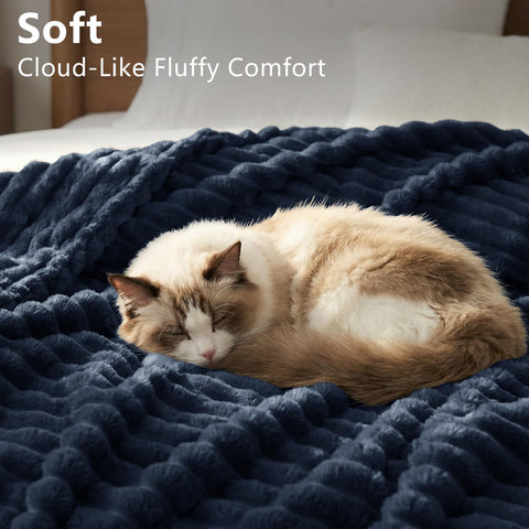 HIMEET navy blue ribbed throw blanket draped on bed creates inviting year-round comfort
