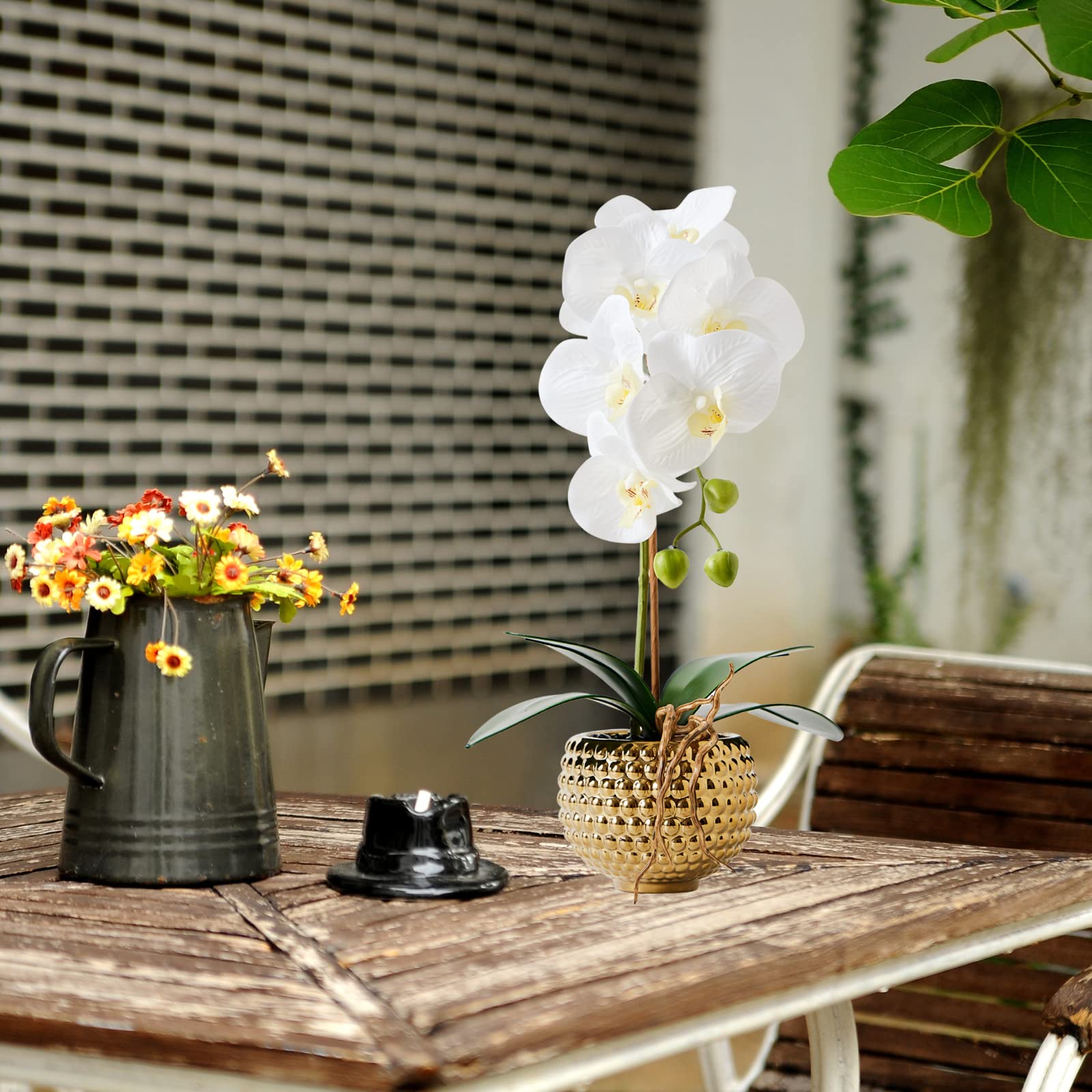 Dining table centerpiece featuring Hisow Orchids for a subtle focal point.